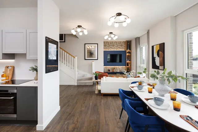 Eastman Village duplex show home kitchen, dining and living area