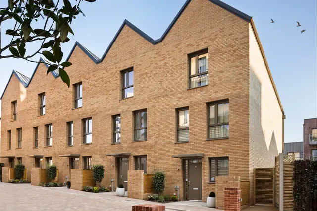 Row of brick townhouses at Hendon Waterside