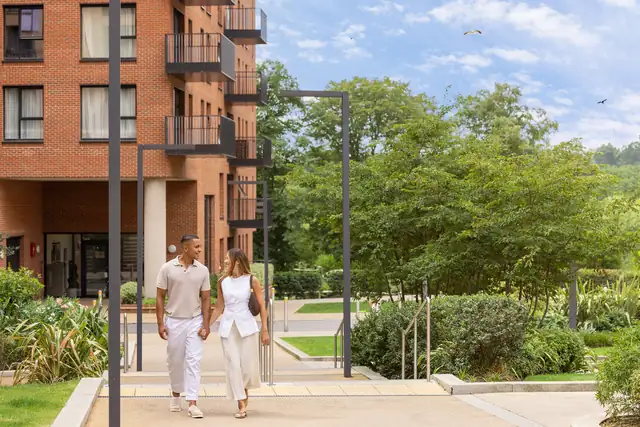 Hendon Waterside apartment building beside a landscaped walkway