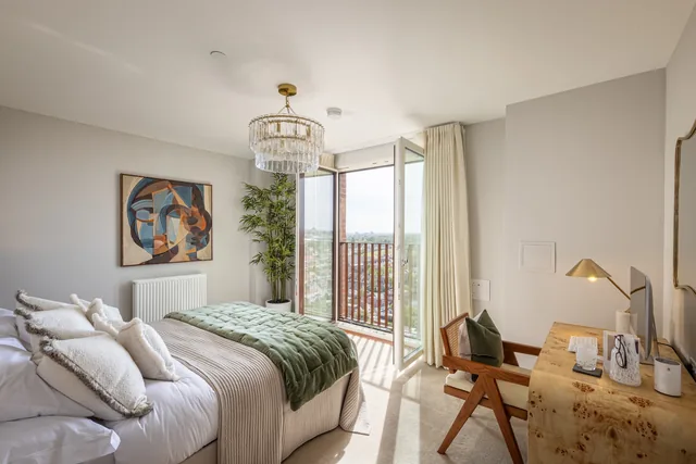 Royal Gateway show home bedroom with a door to the balcony