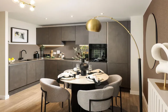 Royal Gateway show home kitchen with a round dining table