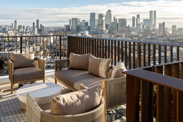 Terrace seating at Bow Green looking out over the east London skyline
