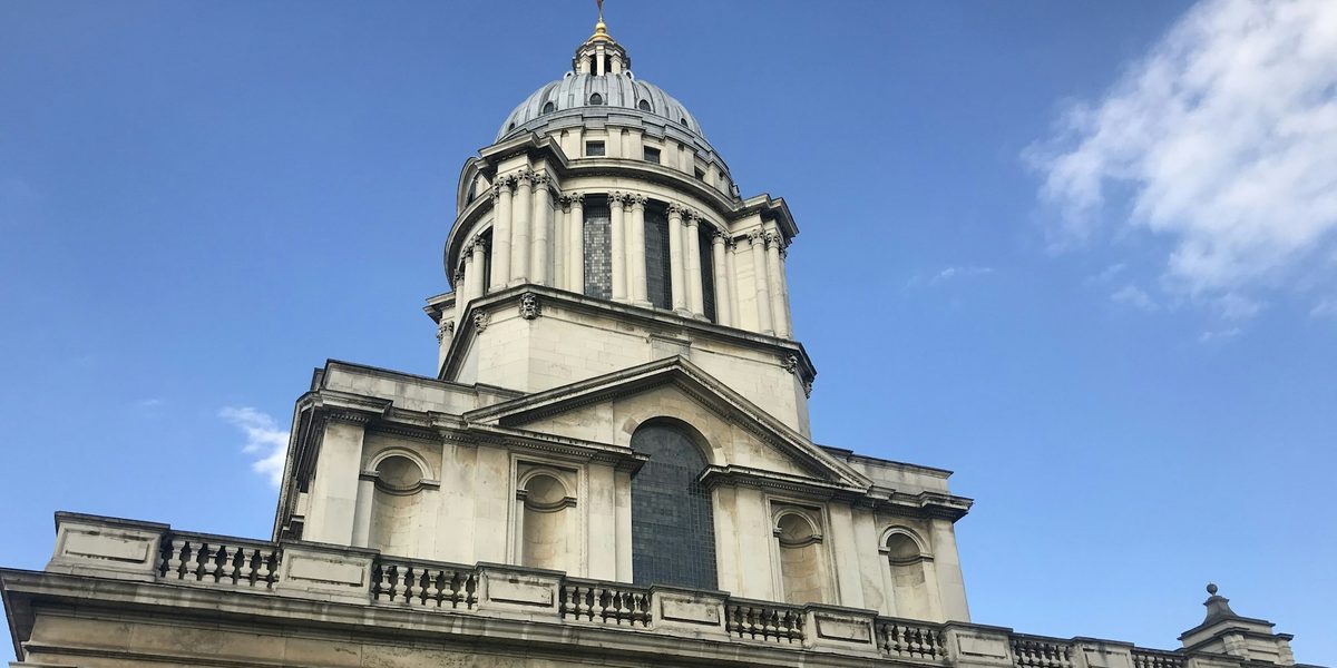 A domed stone building with columns on the University of Greenwich campus